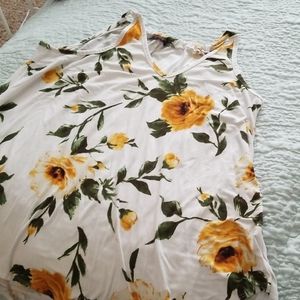 White tank with yellow roses
